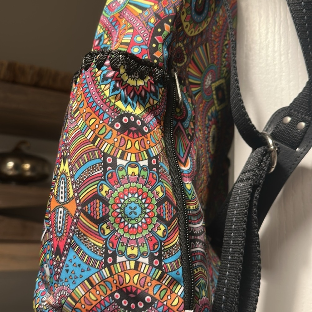 Sakroots Red and Pink Bohemian Backpack with Artistic Flair - Picture 2 of 9